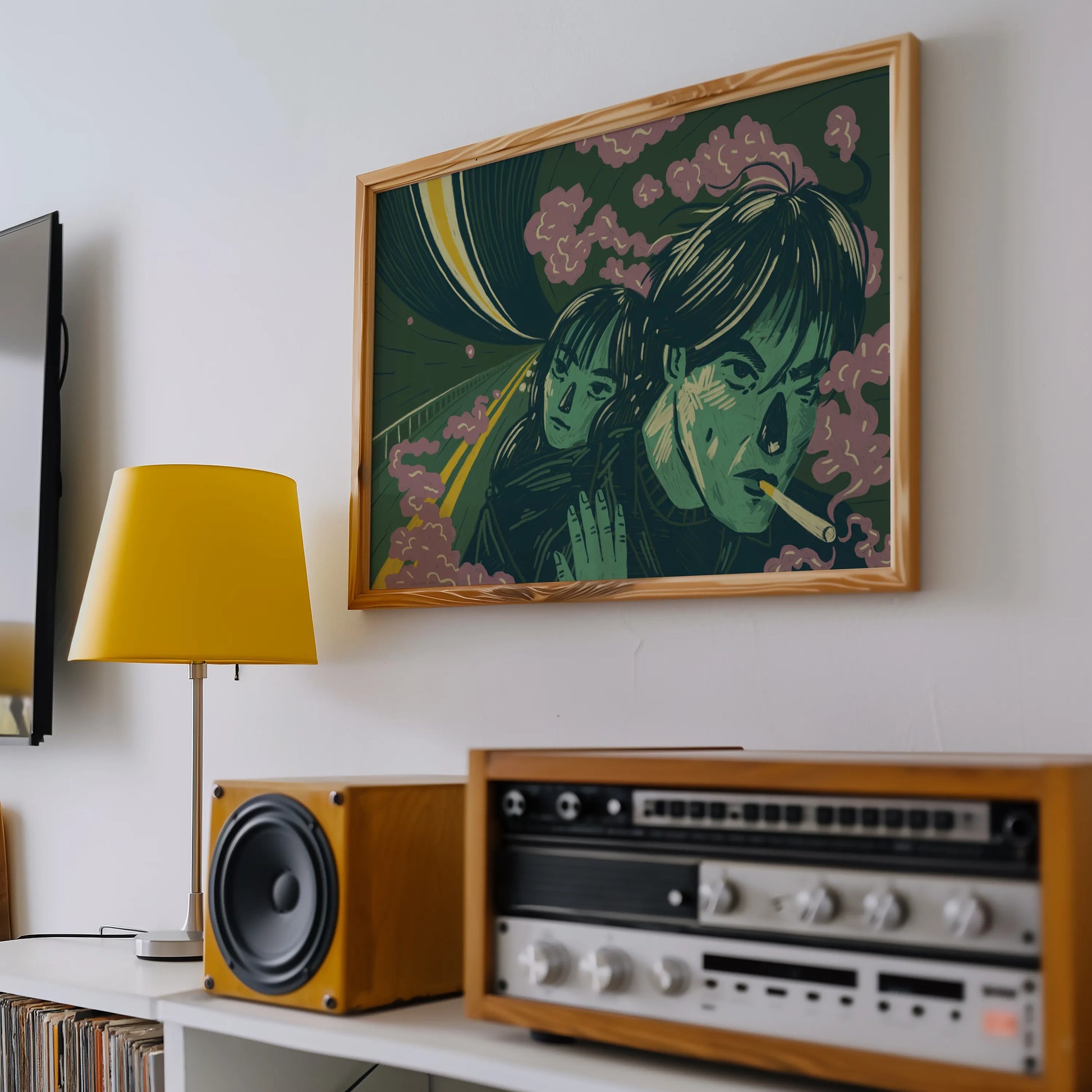 Framed artwork by New York City (NYC) based artist Max Kolo of an illustration inspired by Wong Kar-wai’s iconic film "Fallen Angels"on a wall above vintage stereo equipment and a lamp.