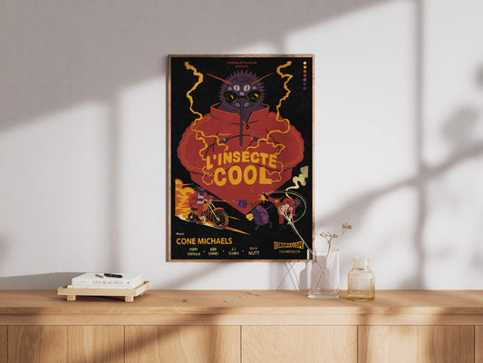 Framed ‘L’insecte Cool’ bug-noir poster by NYC artist Max Kolo hanging on a white wall above a wooden sideboard, featuring a retro French noir insect character illustration in bold colors.