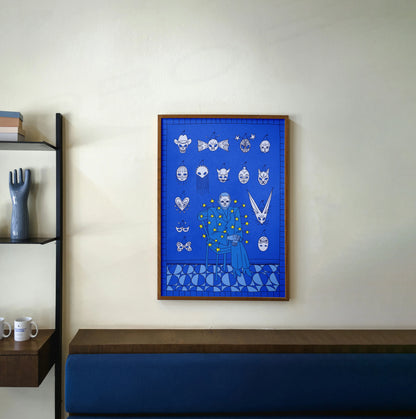 Framed blue artwork with white patterns (masks) on a wall above a wooden couch. artwork by New York City artist Max Kolo.