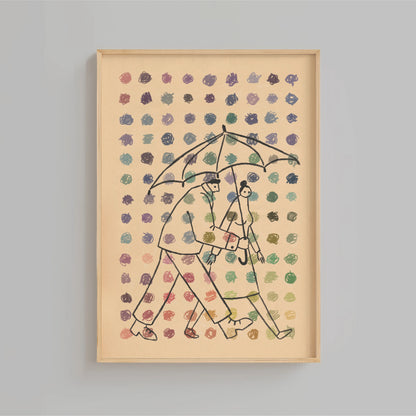 Framed artwork of two people under an umbrella with a patterned background and dots of multiple colors in the foreground set on a gray wall. Artwork by New York City Artist Max Kolo.